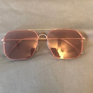 Pink lenses, gold frames